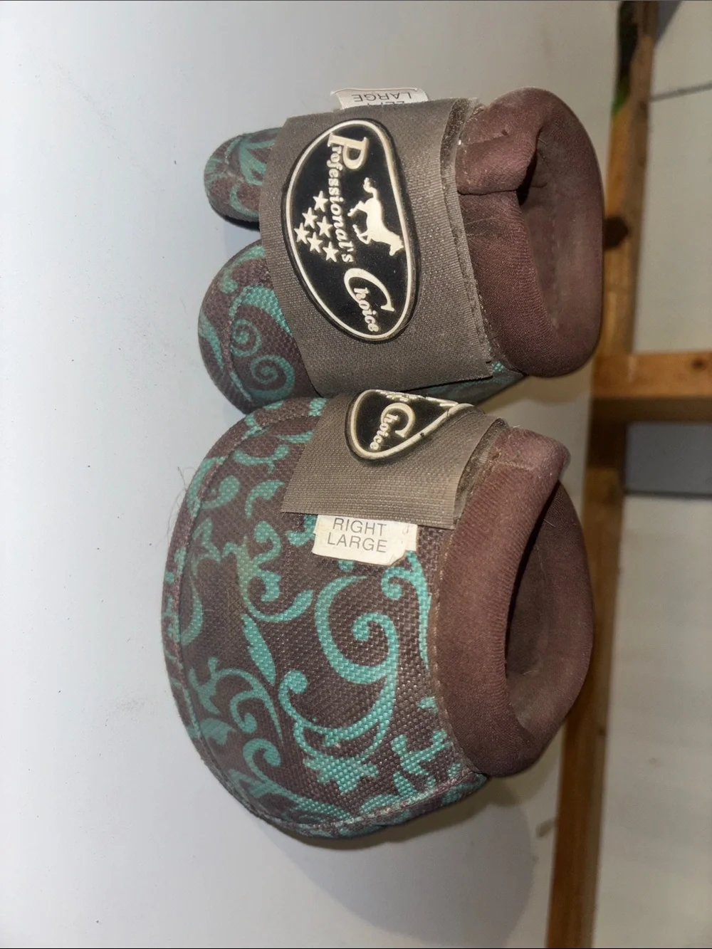 Brown and Teal Patterned Professionals Choice Horse Bell Boots.